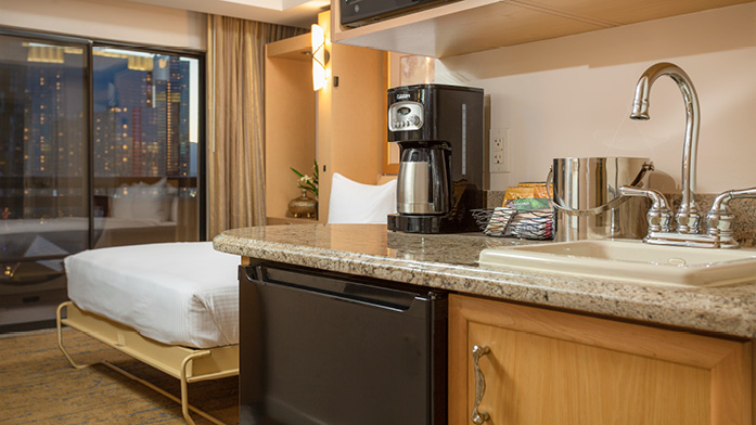 Polo Towers Villas murphy bed and kitchen